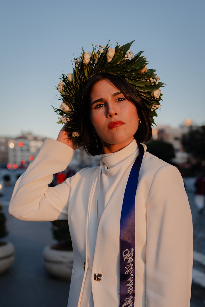 confident woman with laurel wreath outdoors